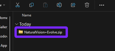 Windows File Explorer showing the downloaded 'NaturalVision+Evolve.zip' file, ready for extraction to install the GTA 5 graphics mod.